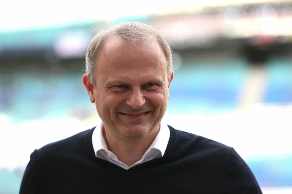 Jochen Schneider lächelt