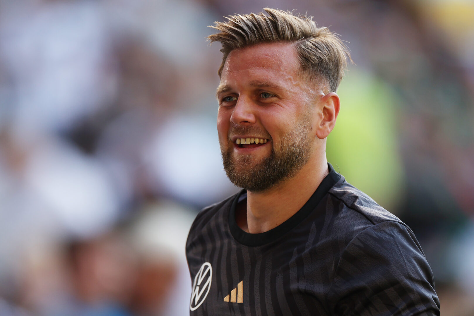 Niclas Füllkrug lächelt über die Aussage von Max Eberl.