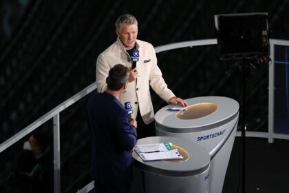 Matthias Opdenhoevel und Bastian Schweinsteiger